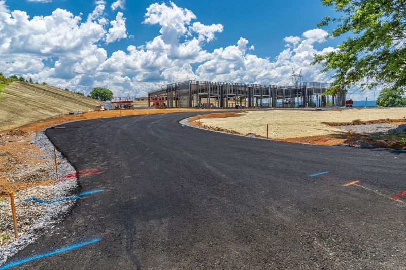 Blacktop Driveway with Curved Design
